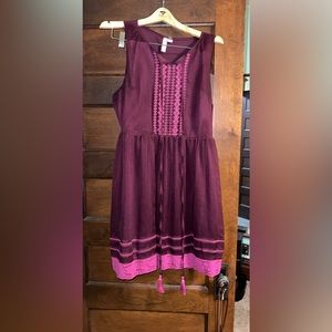 Purple dress with tassels